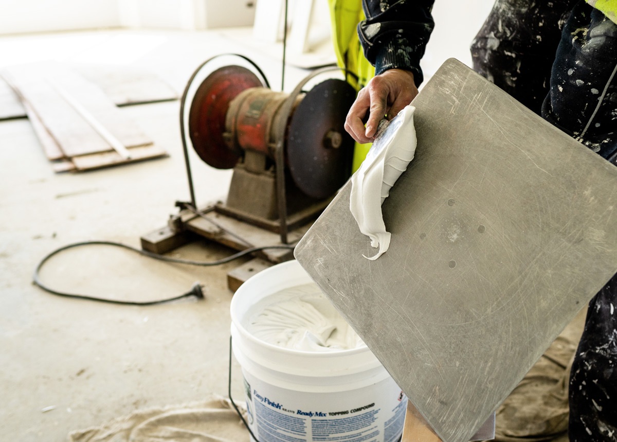 plasterer using plastering tools - Plastering service Christchurch